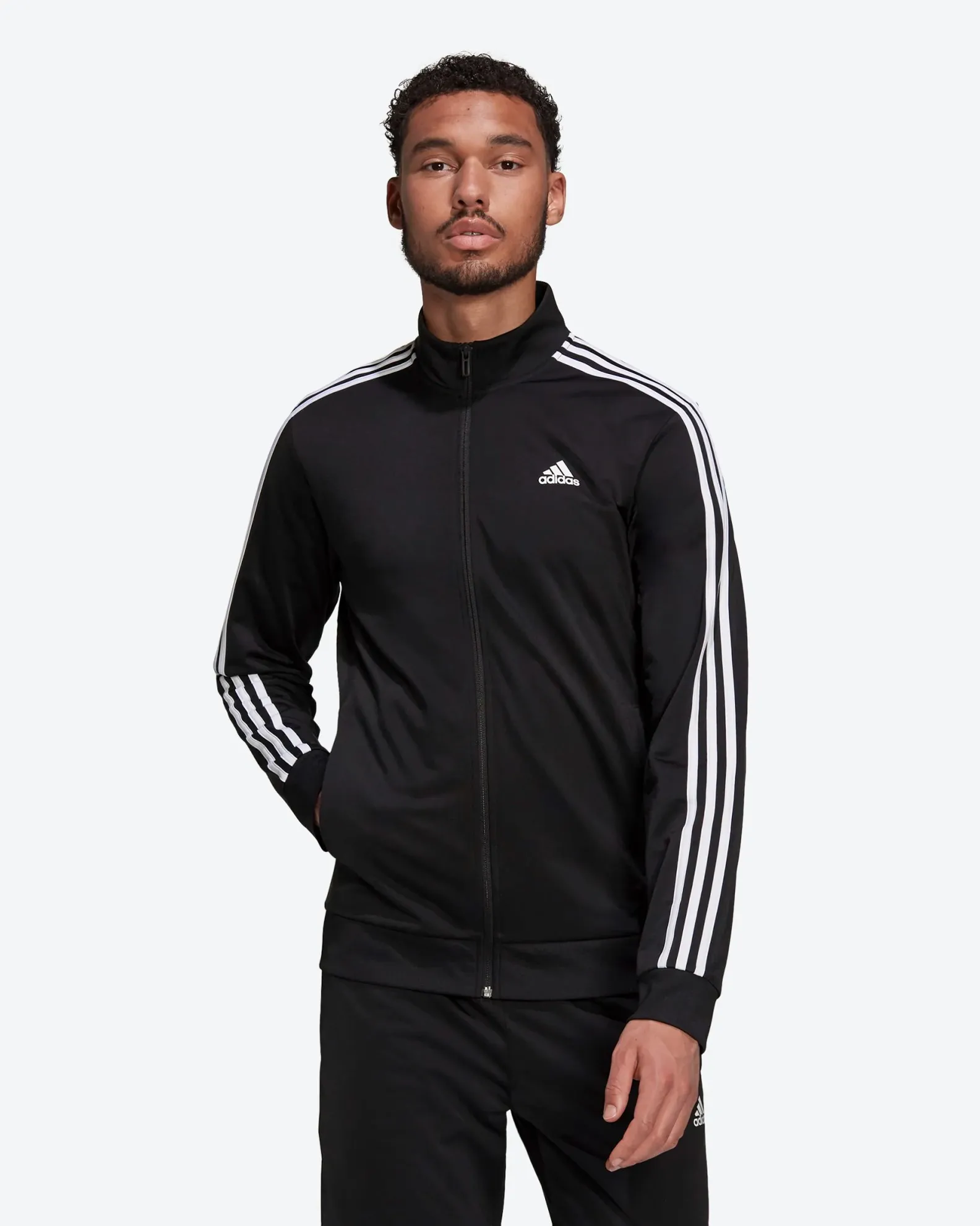 ADIDAS - GIACCA DA ALLENAMENTO PRIMEGREEN ESSENTIALS WARM-UP 3-STRIPES - H46099                                            Previ