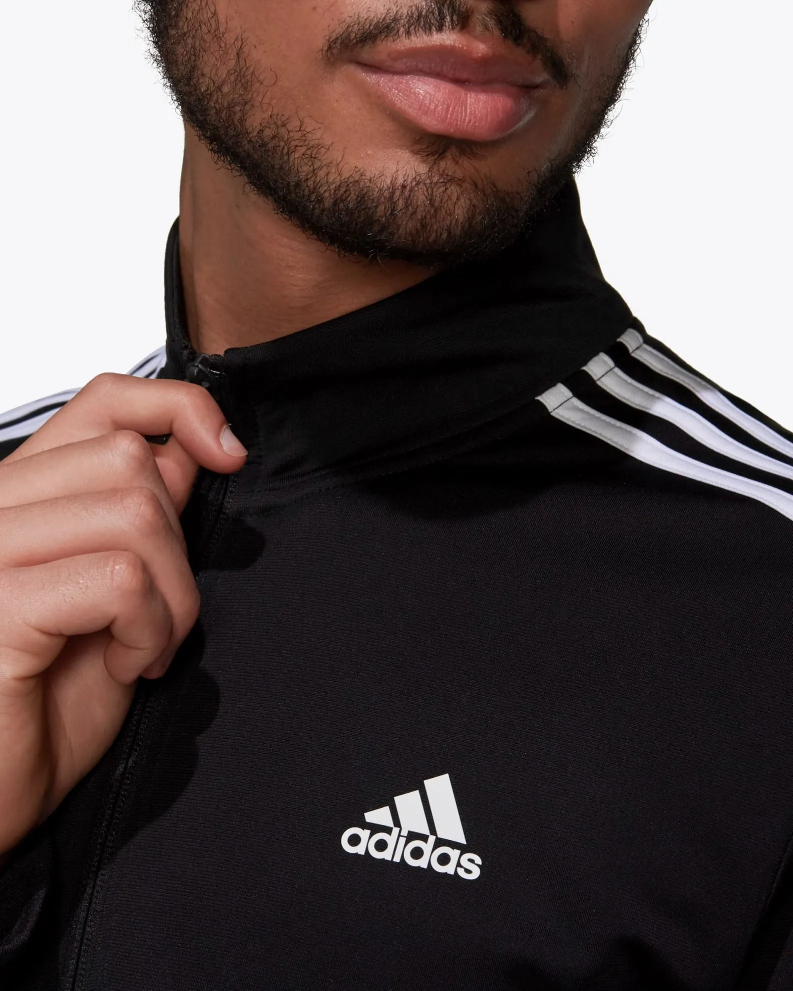 ADIDAS - GIACCA DA ALLENAMENTO PRIMEGREEN ESSENTIALS WARM-UP 3-STRIPES - H46099                                            Previ