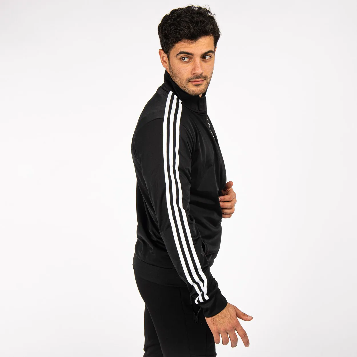 ADIDAS - GIACCA DA ALLENAMENTO PRIMEGREEN ESSENTIALS WARM-UP 3-STRIPES - H46099                                            Previ
