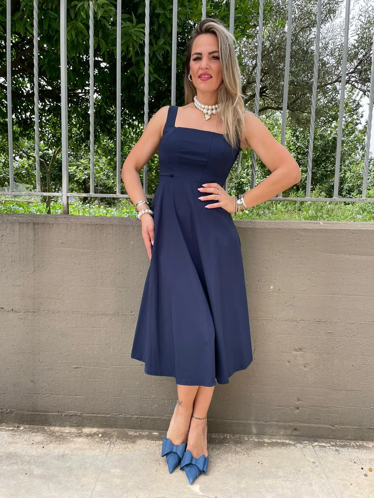 Vestito midi scampanato con corpetto