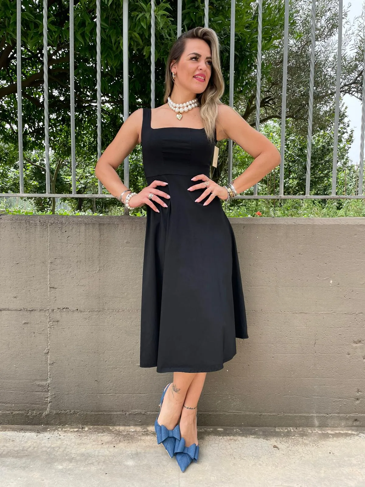 Vestito midi scampanato con corpetto